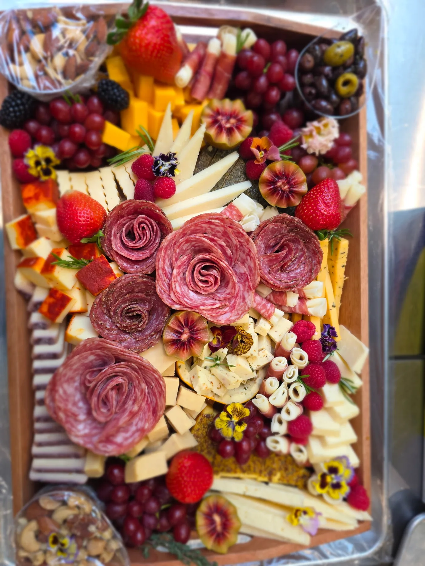 A fresh grazing box with berries and cheese