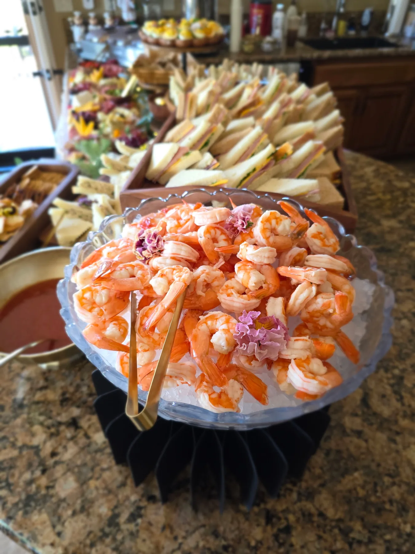 A serving bowl of pasta salad with event bites