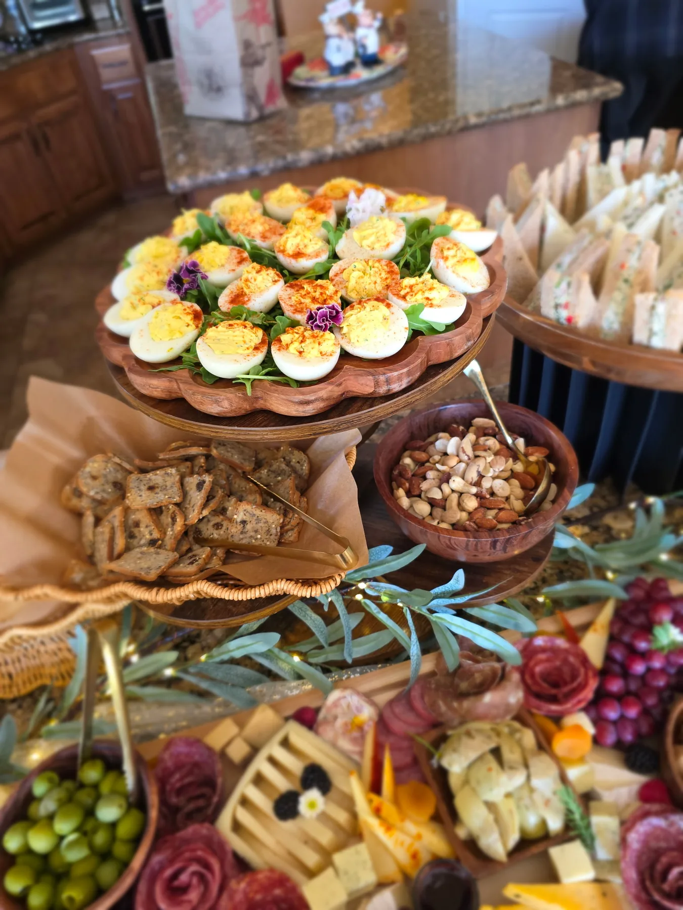 A full catering table with grazing food and small bites
