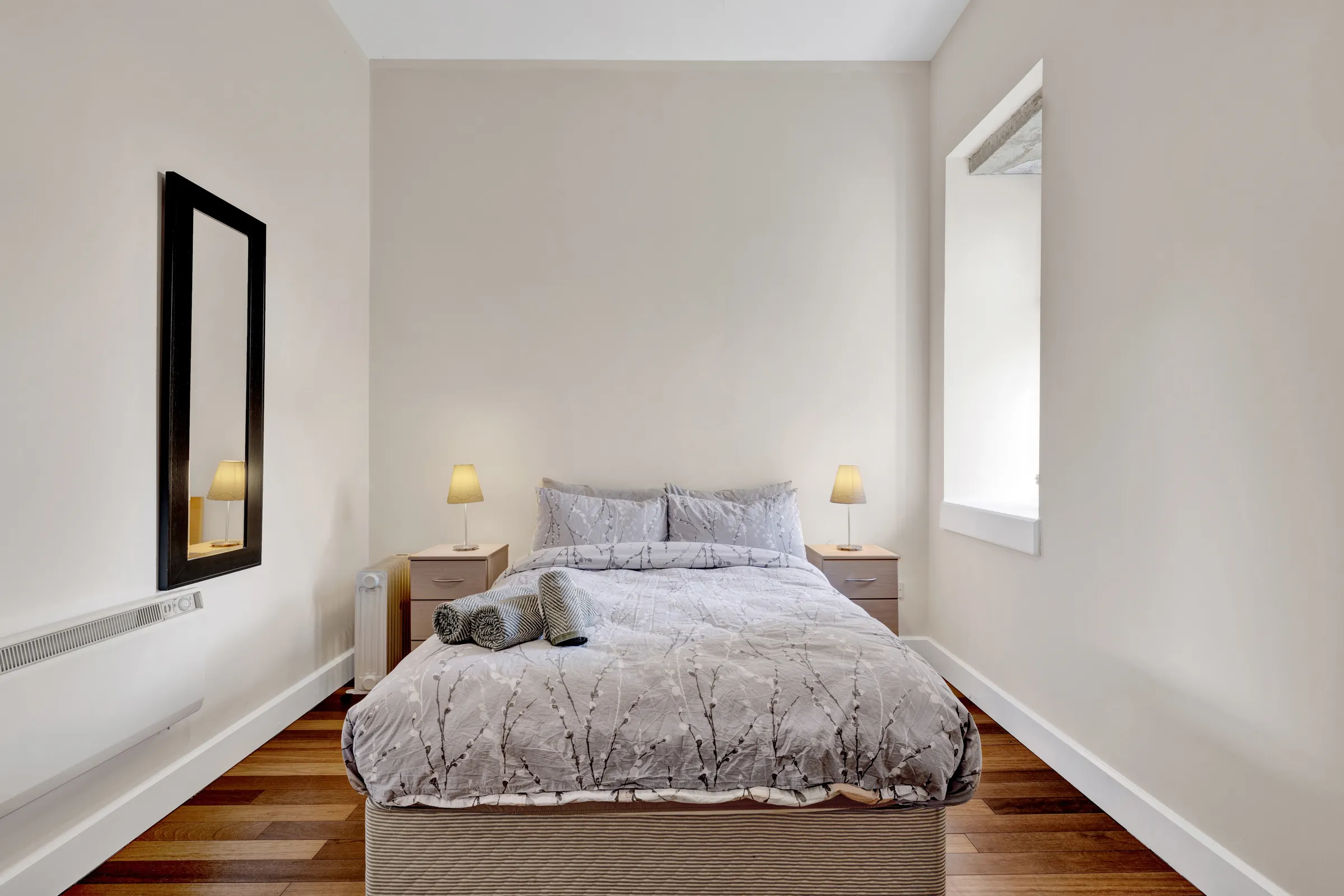 Bright bedroom with a double bed