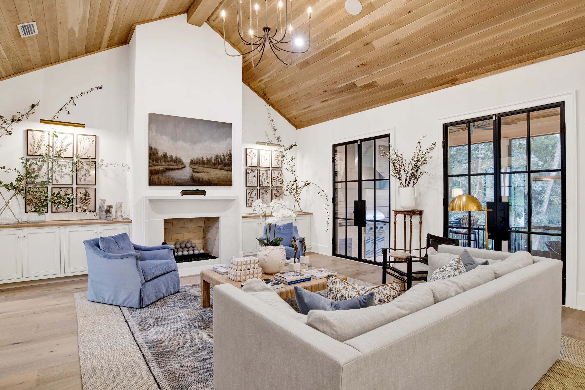 Bright open-plan living room with timber ceiling