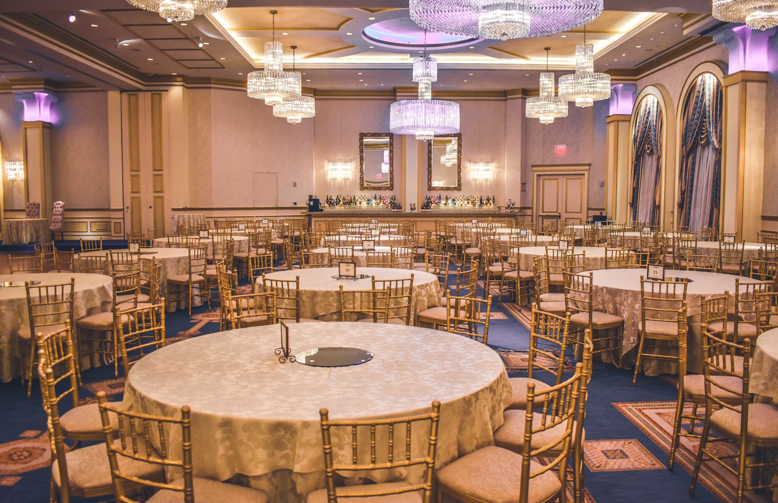 A warmly lit celebration space prepared for a couple's milestone