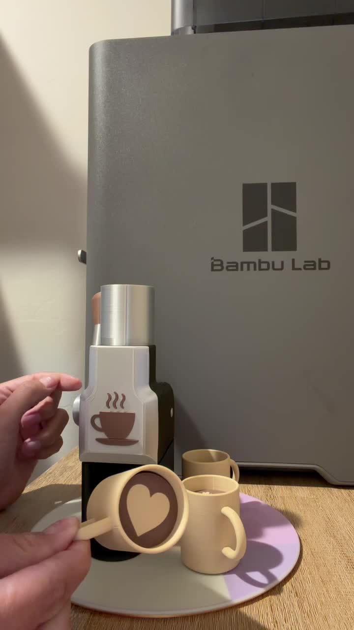 A handmade miniature espresso set made with 3D printing
