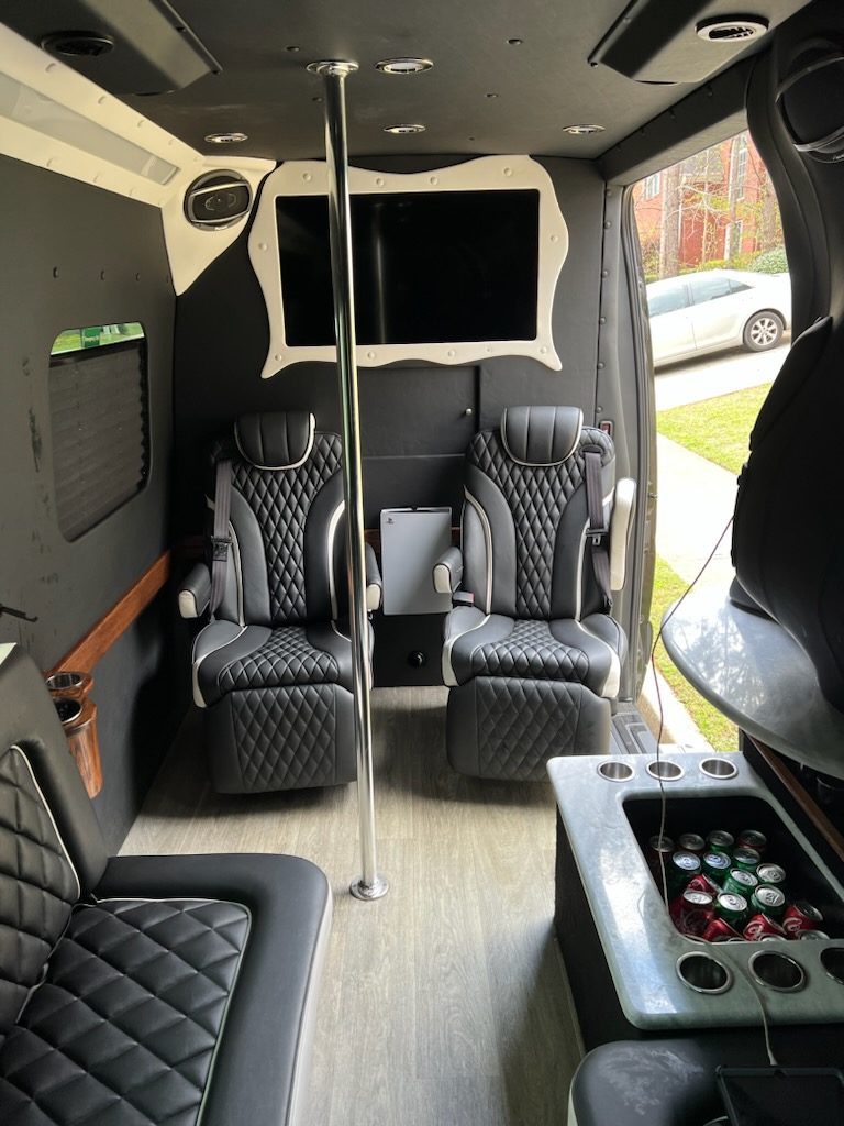 Quilted passenger seating inside a Sprinter