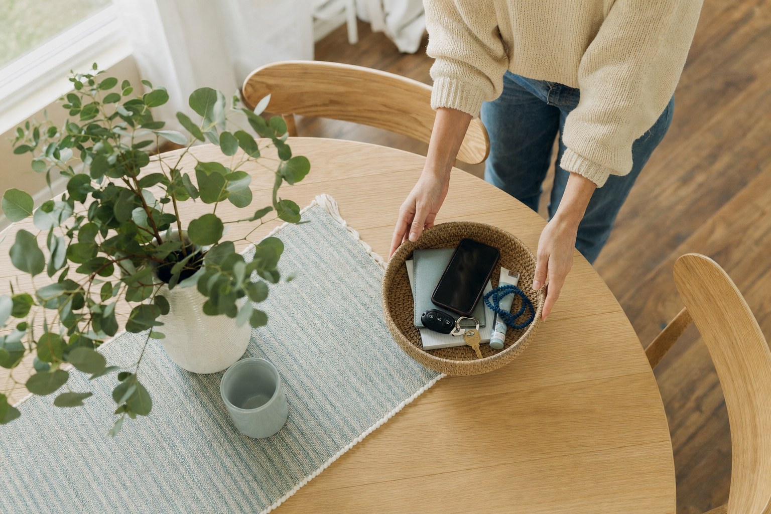 Preparing a dining table ahead of a cleaning visit