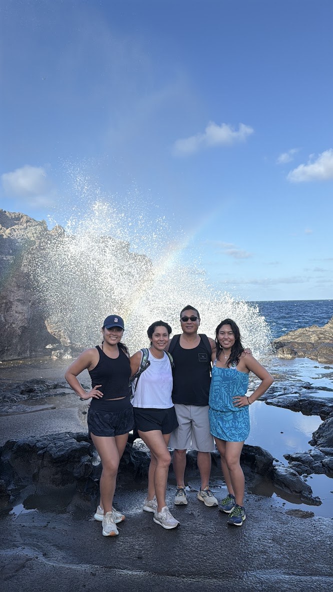 A family moment by the ocean in Hawaii
