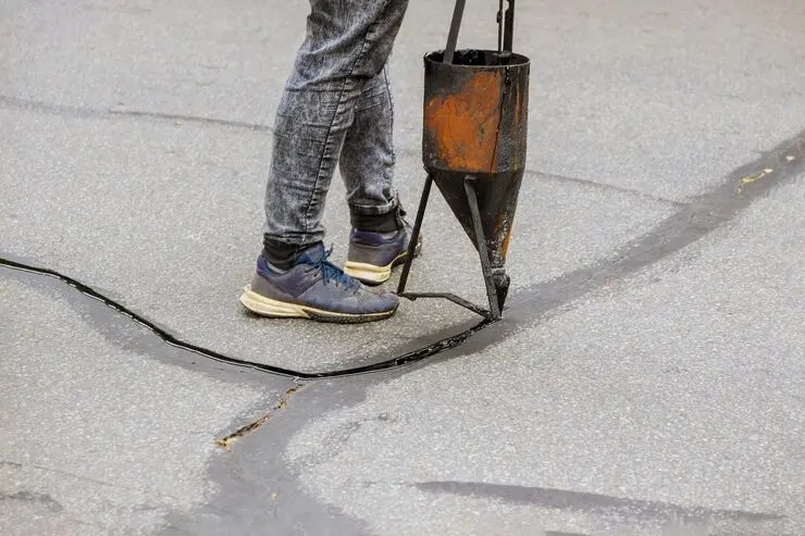Hot Crack Seal & Speed Bumps project photograph 4