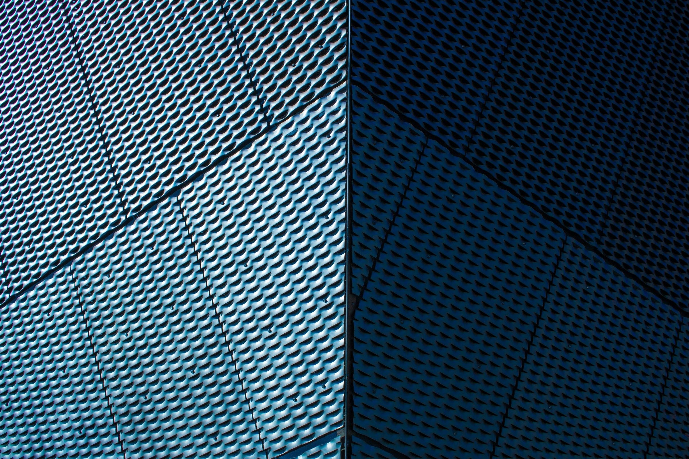 Blue and silver textured metal surface