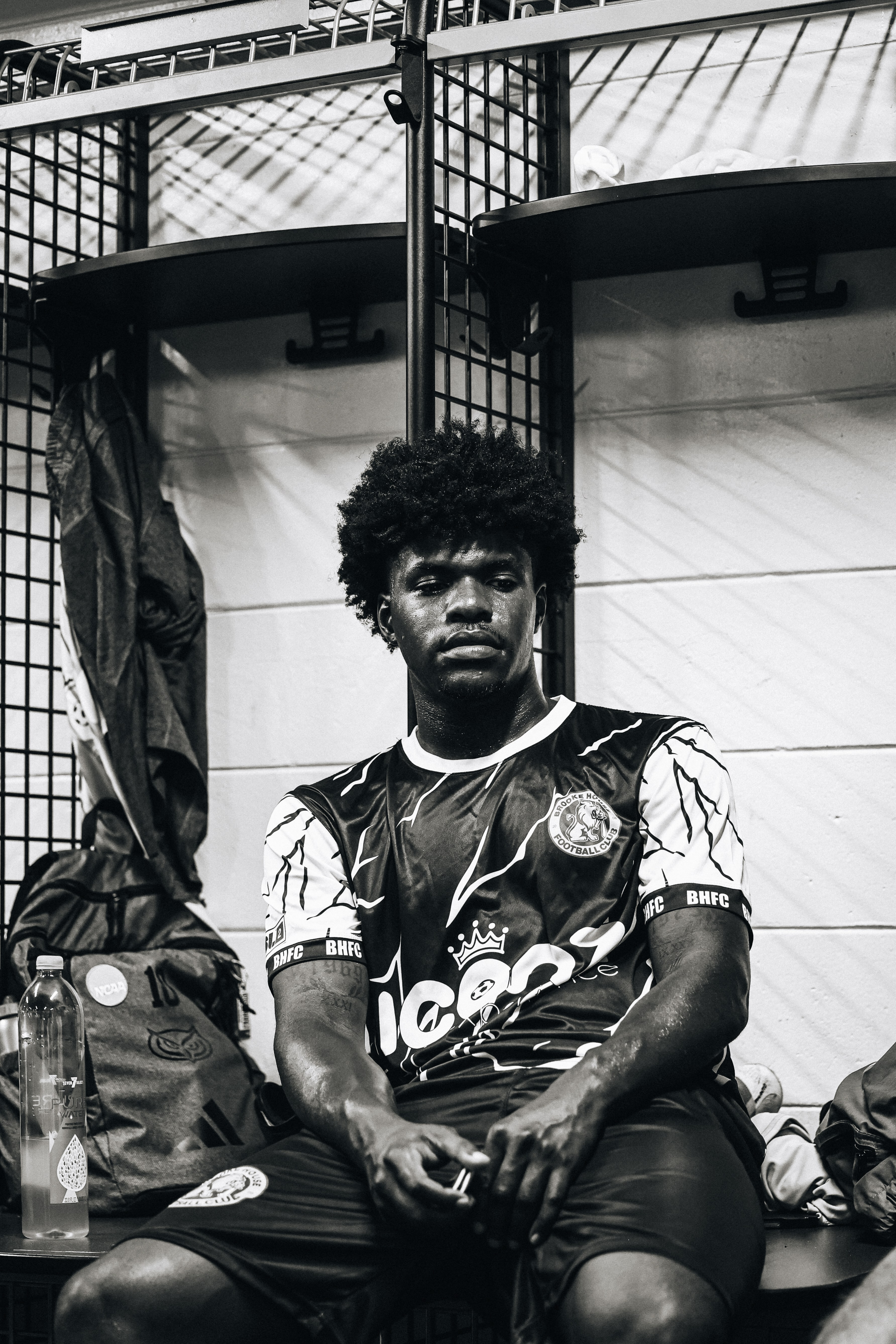 Brooke House FC player focused in the locker room