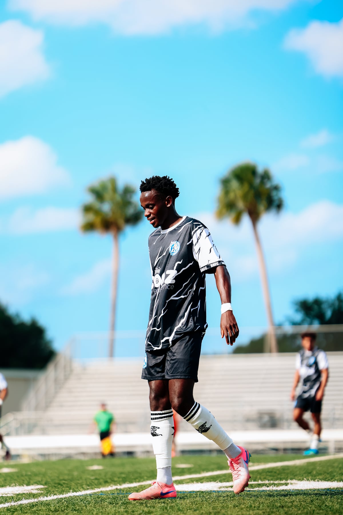 Brooke House FC player driving forward during a match