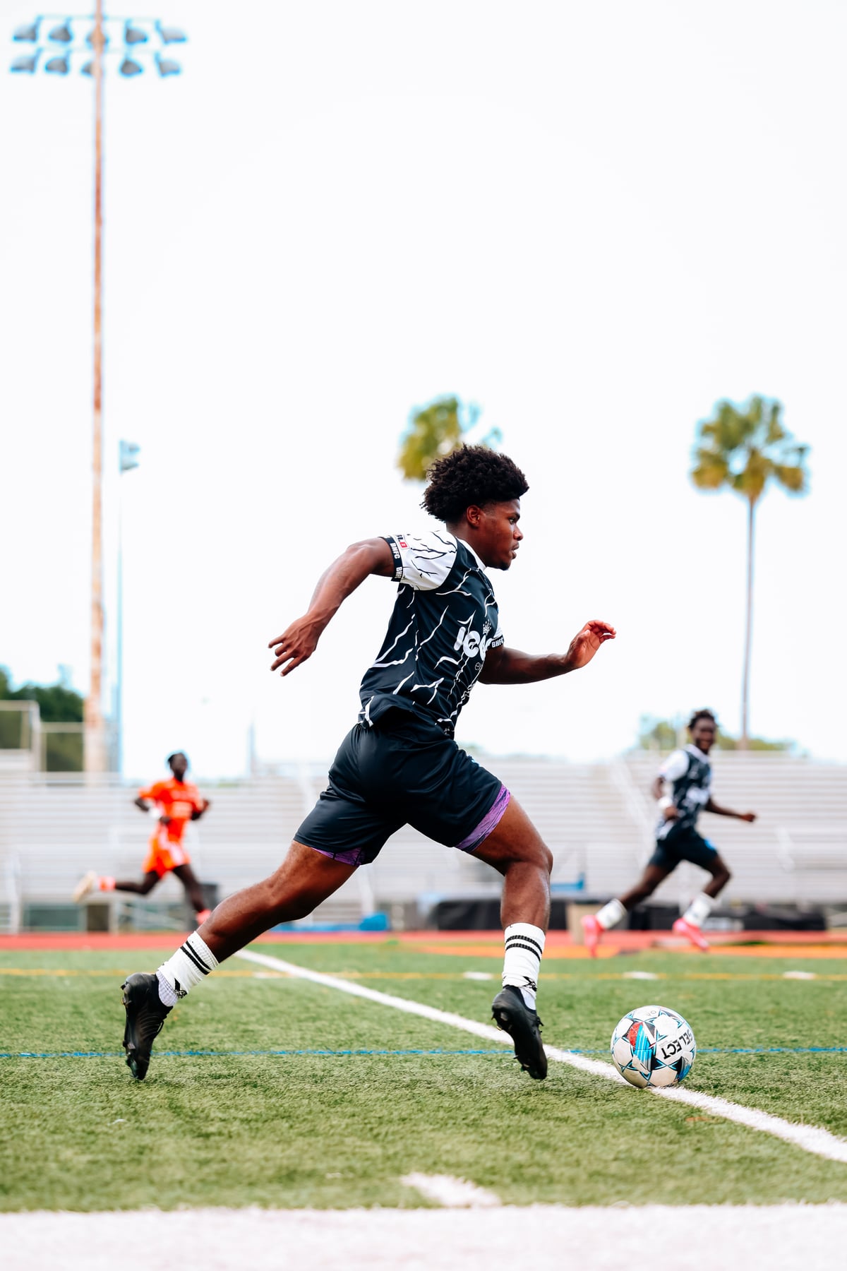 Brooke House FC player in match action