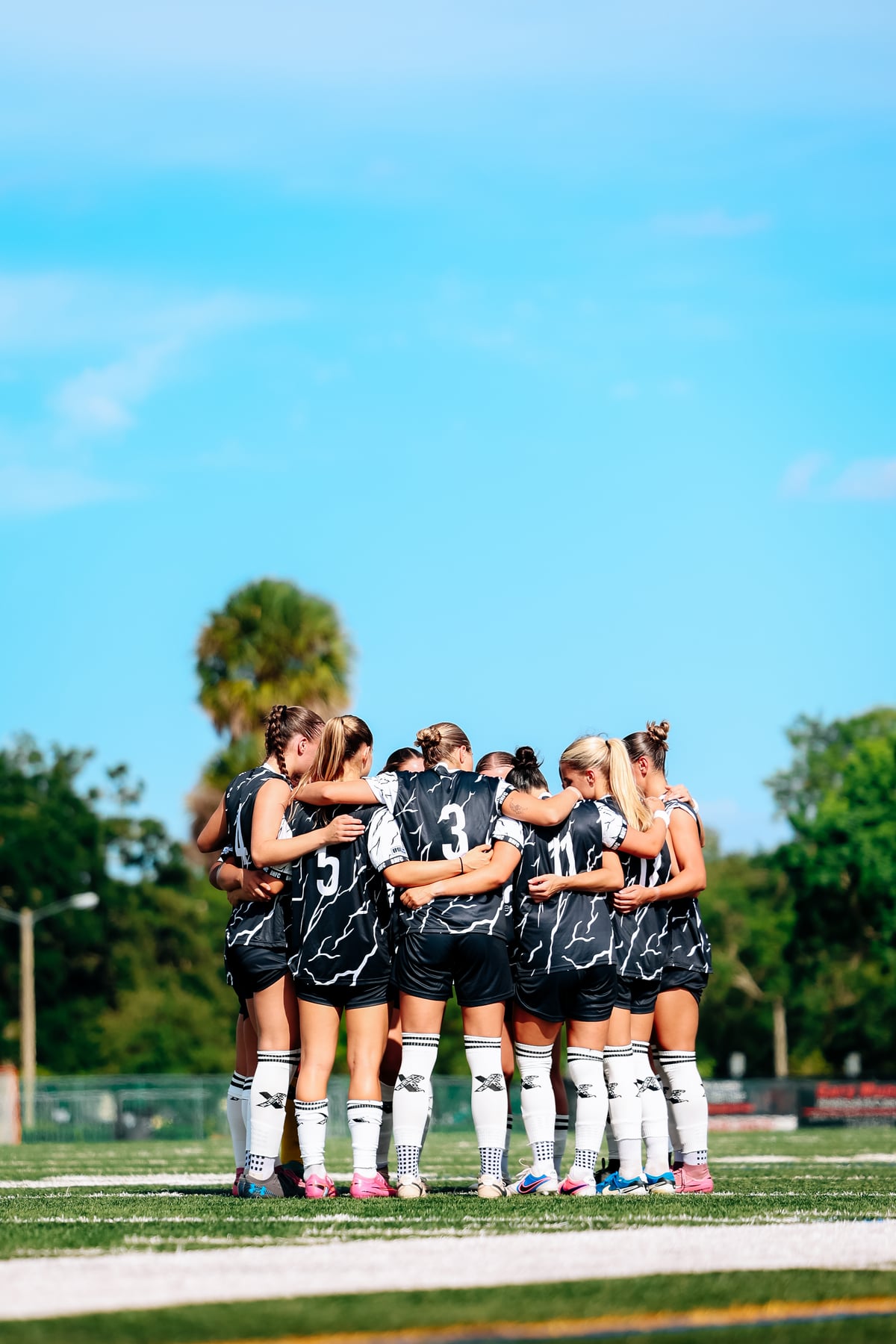 Brooke House FC women's team huddle
