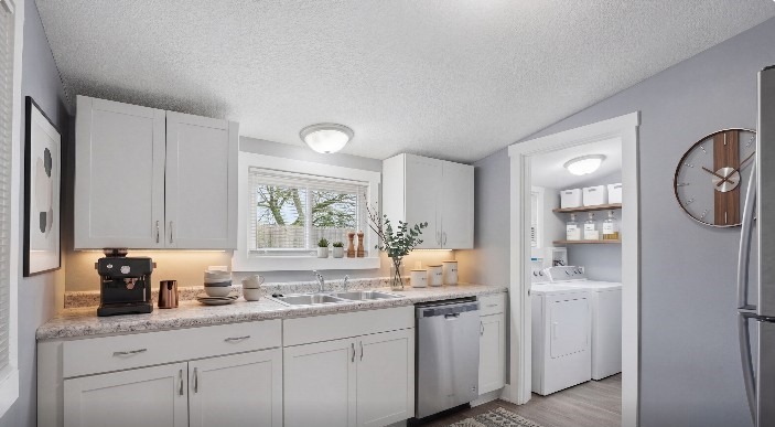 Staged kitchen at 3221 E 12th St in Des Moines
