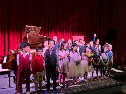 a student recital stage ready for young musicians and their families