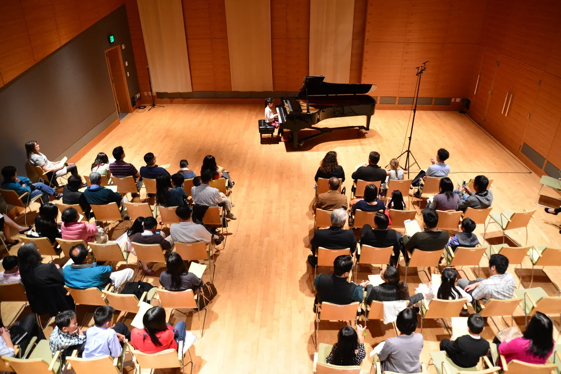 student performing at an Amabile recital