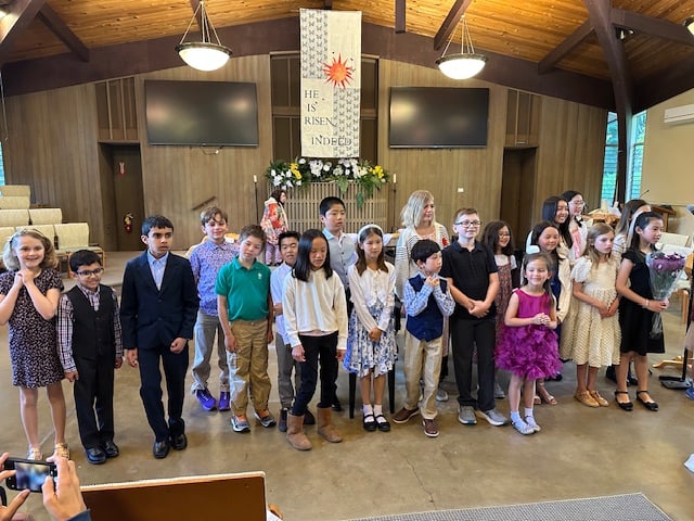 Young performers gathered at a recital