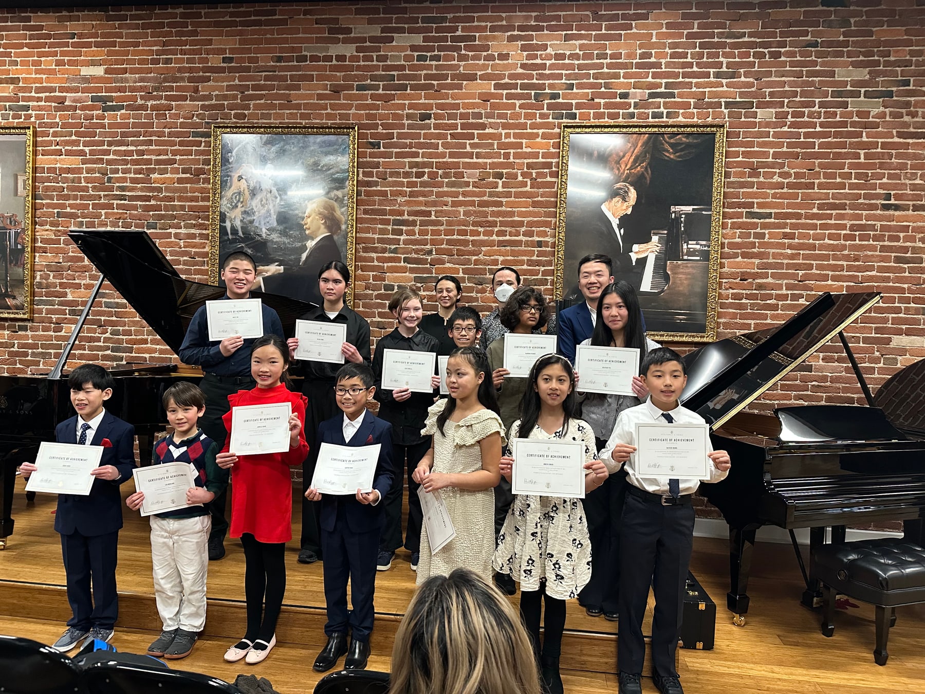 Students receiving recital certificates