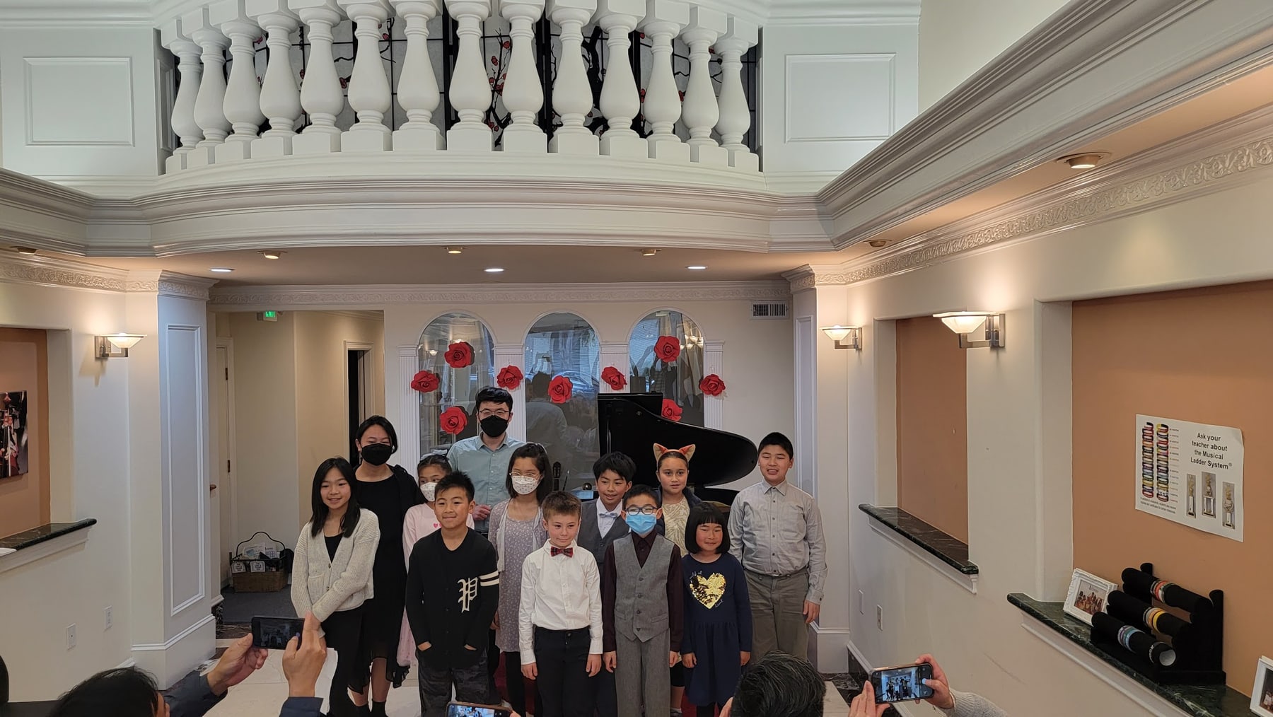 Students gathered after a recital at Amabile