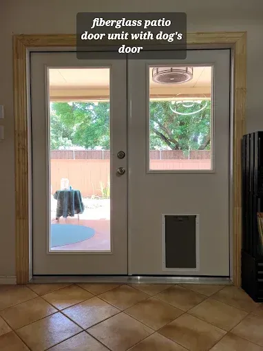 Fiberglass patio door with a pet door