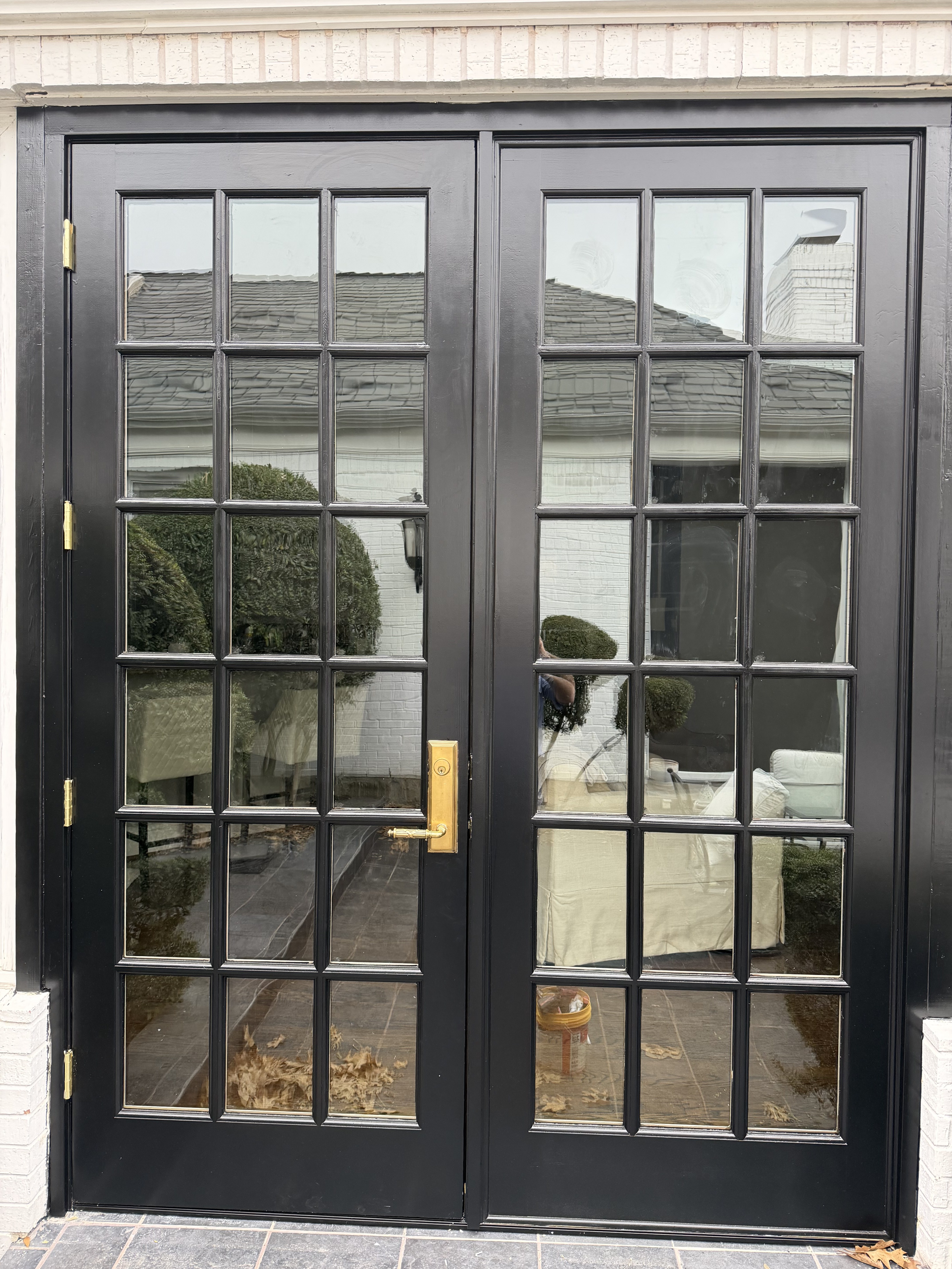 Black double doors with divided glass