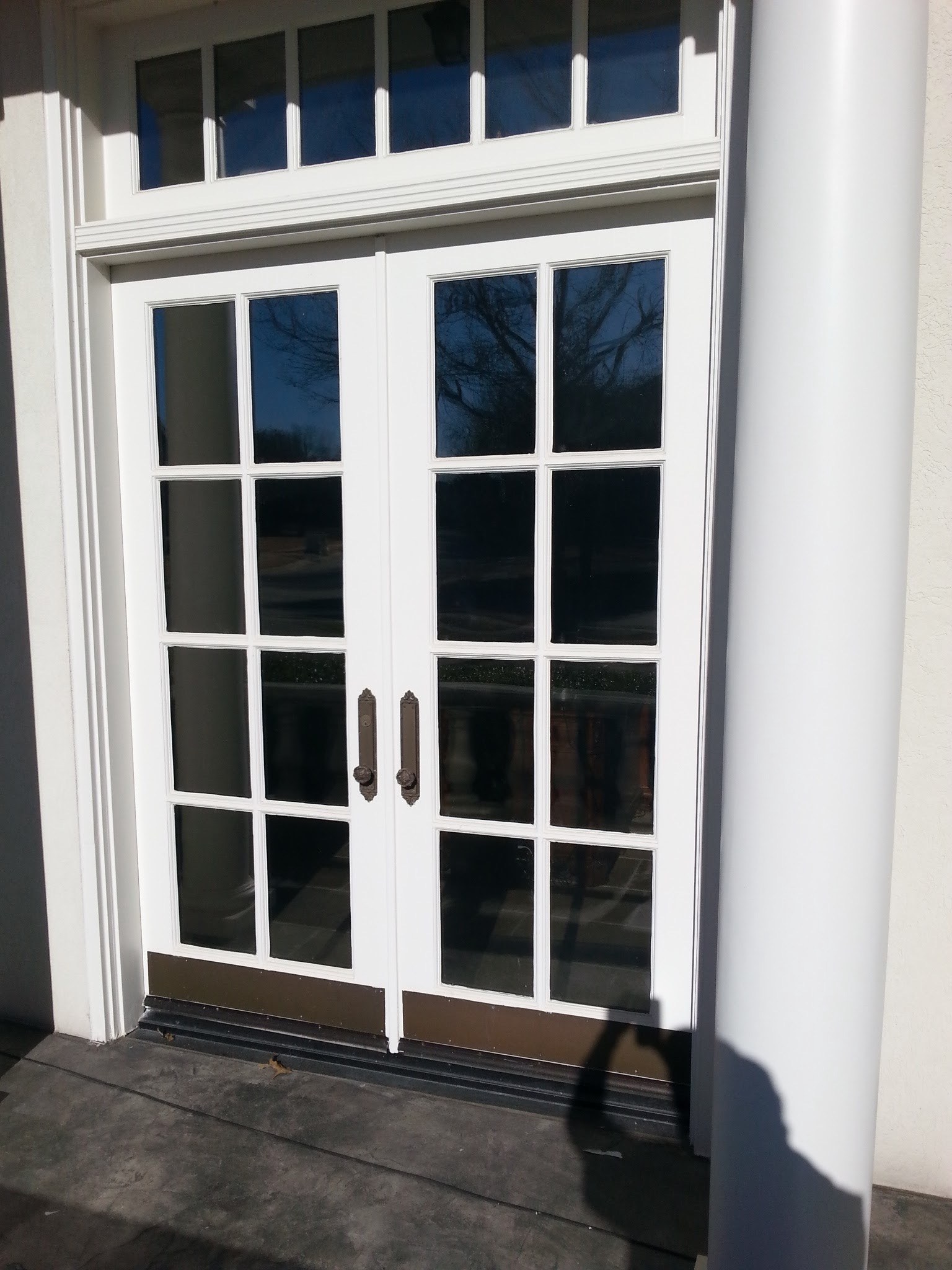 Black French doors with divided glass