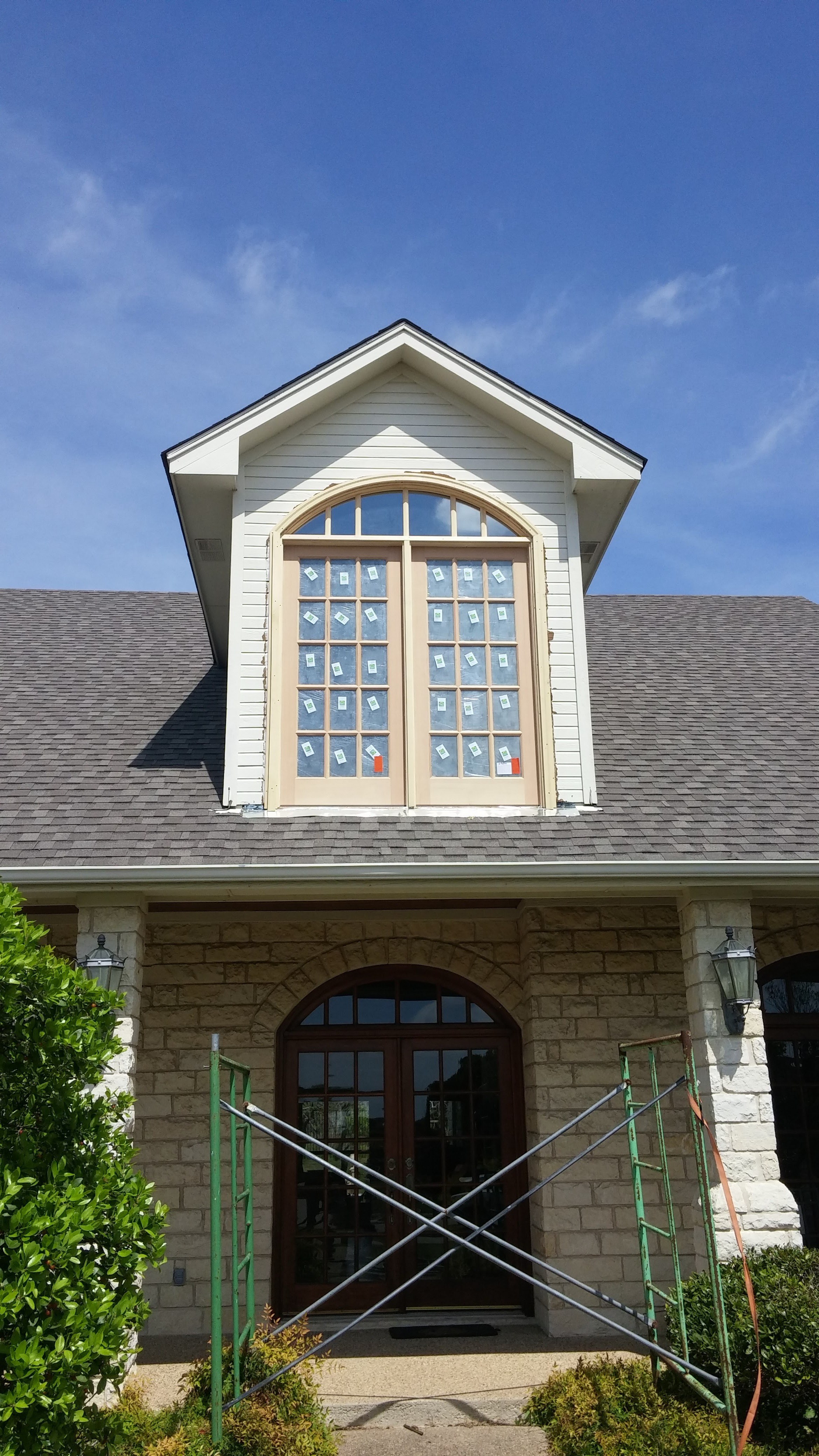 Exterior door beneath a dormer window