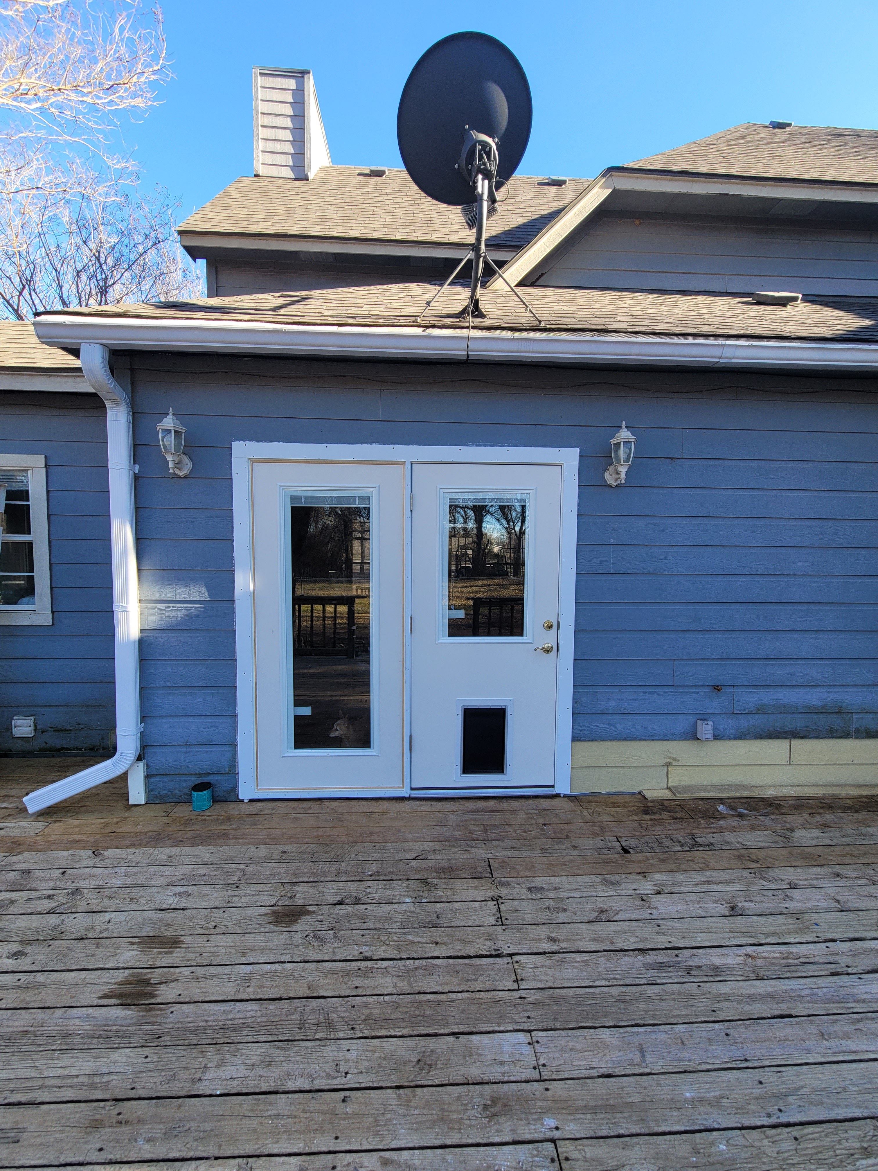 New white-framed glass patio doors