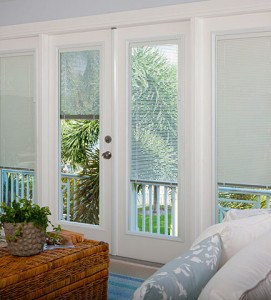 White patio doors in a bright living room