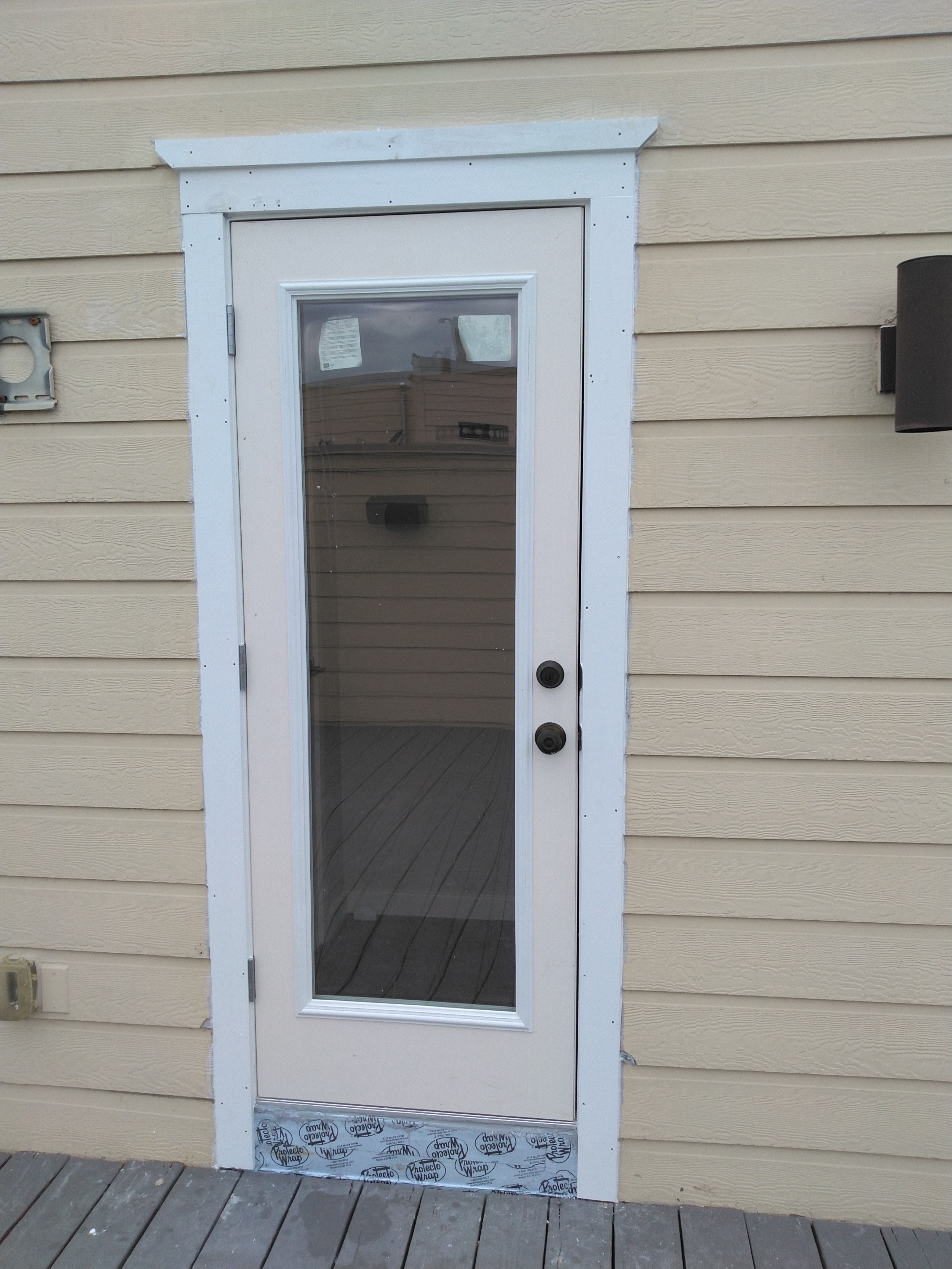Finished white storm door