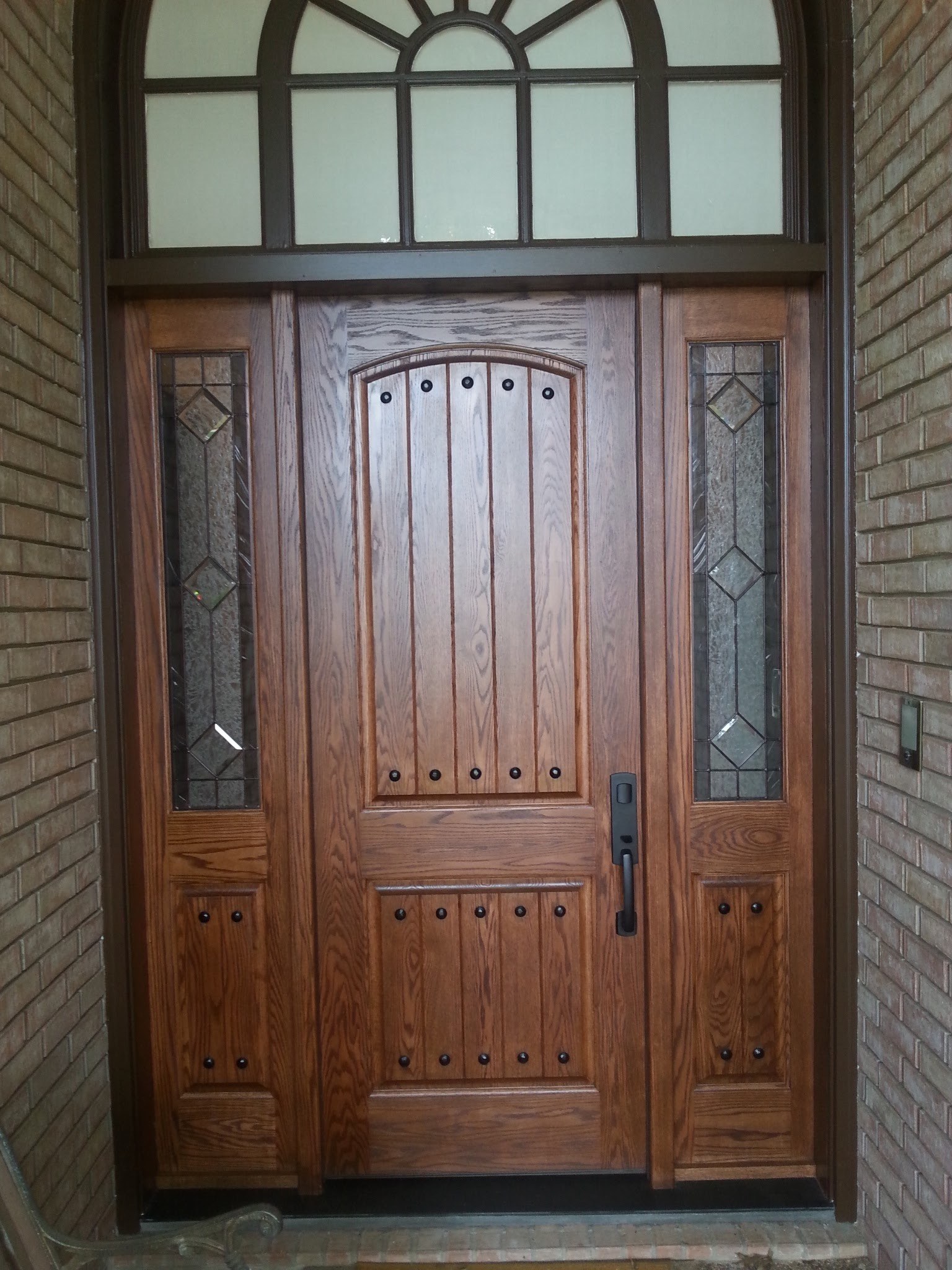 Finished dark wood front door