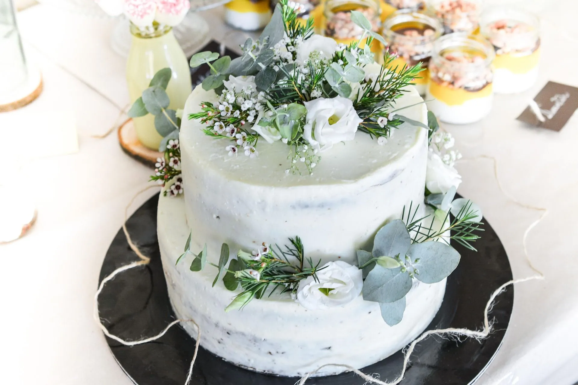 Elegant white wedding cake with floral decoration