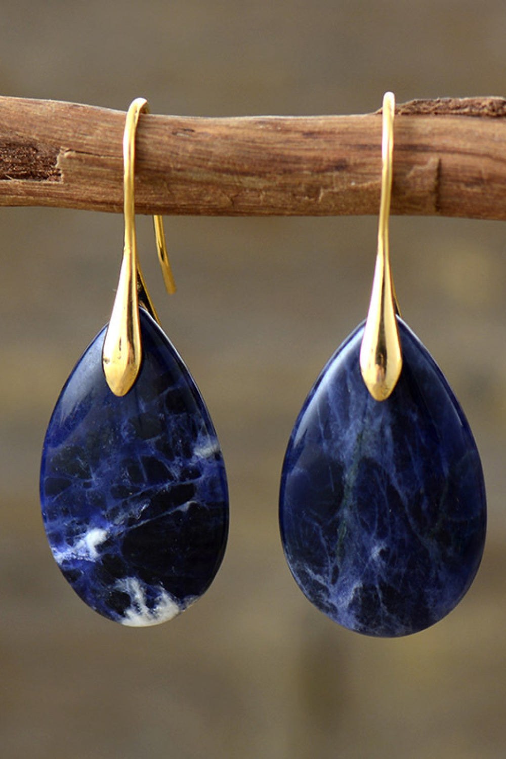 Natural stone teardrop earrings with a silver-tone setting