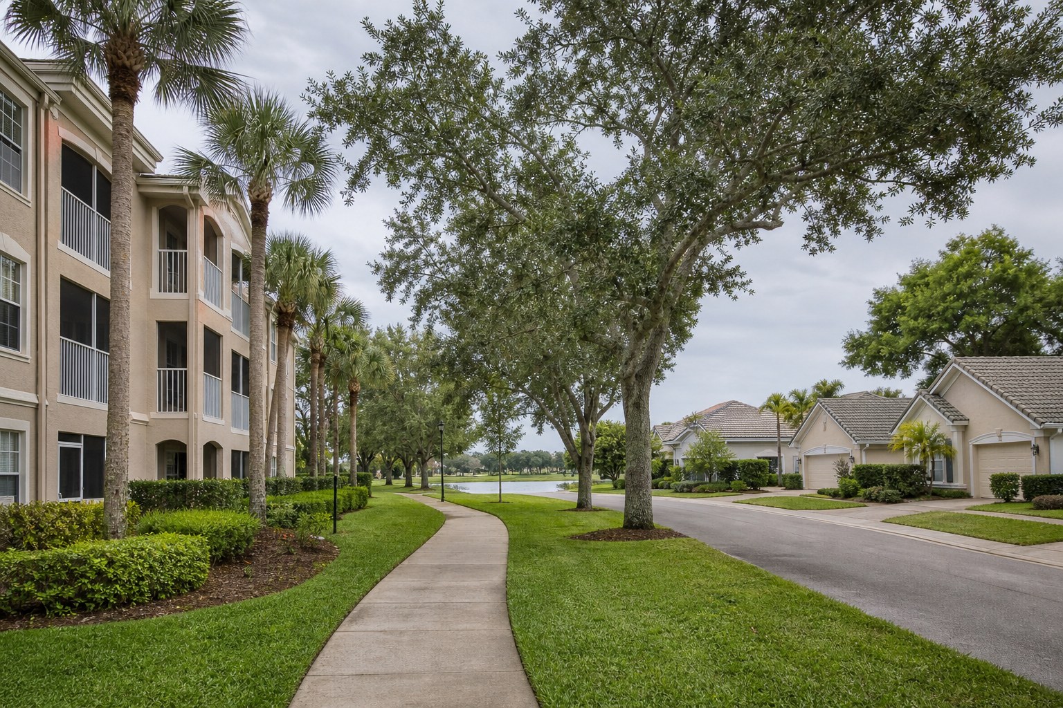 Florida condominium building and detached homes beside a shared neighborhood path