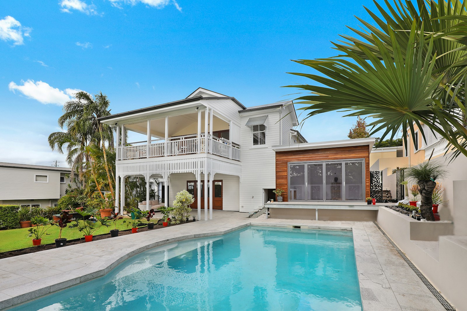 Florida home with palms and a pool