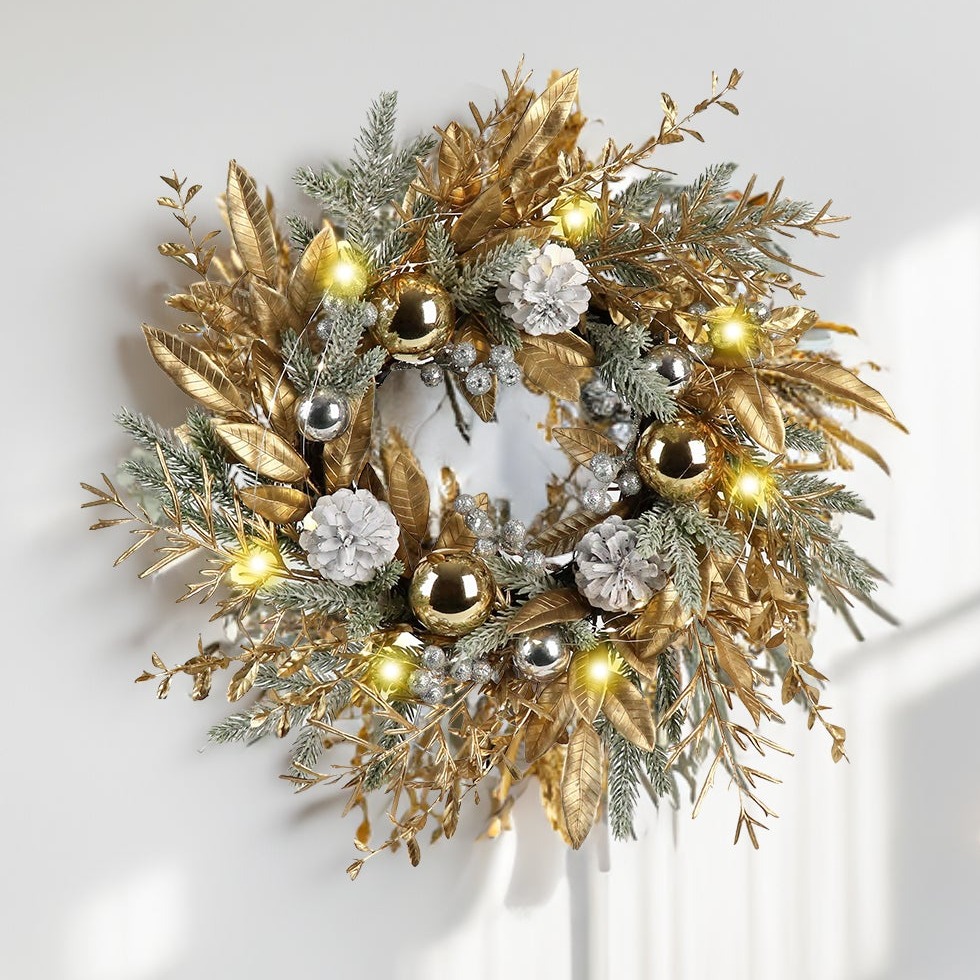 Gold and white Christmas wreath with warm lights