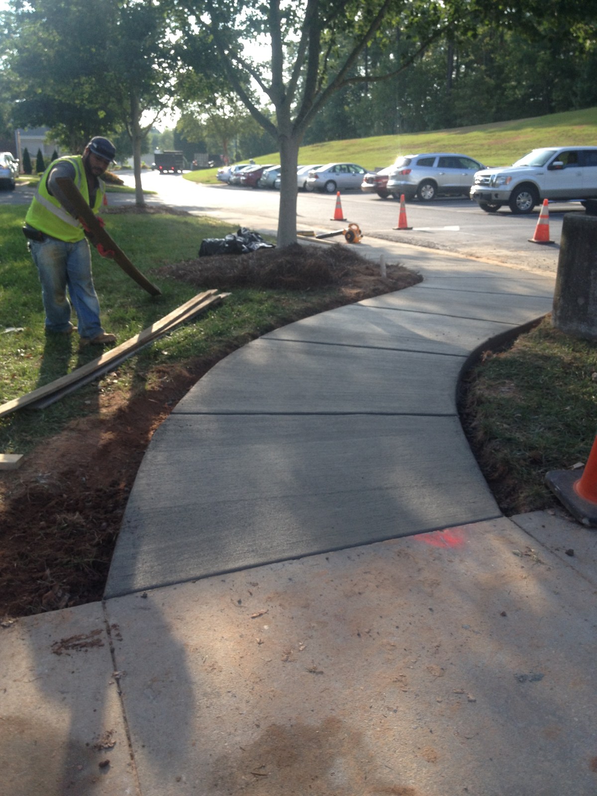 Finished curved concrete sidewalk with control joints