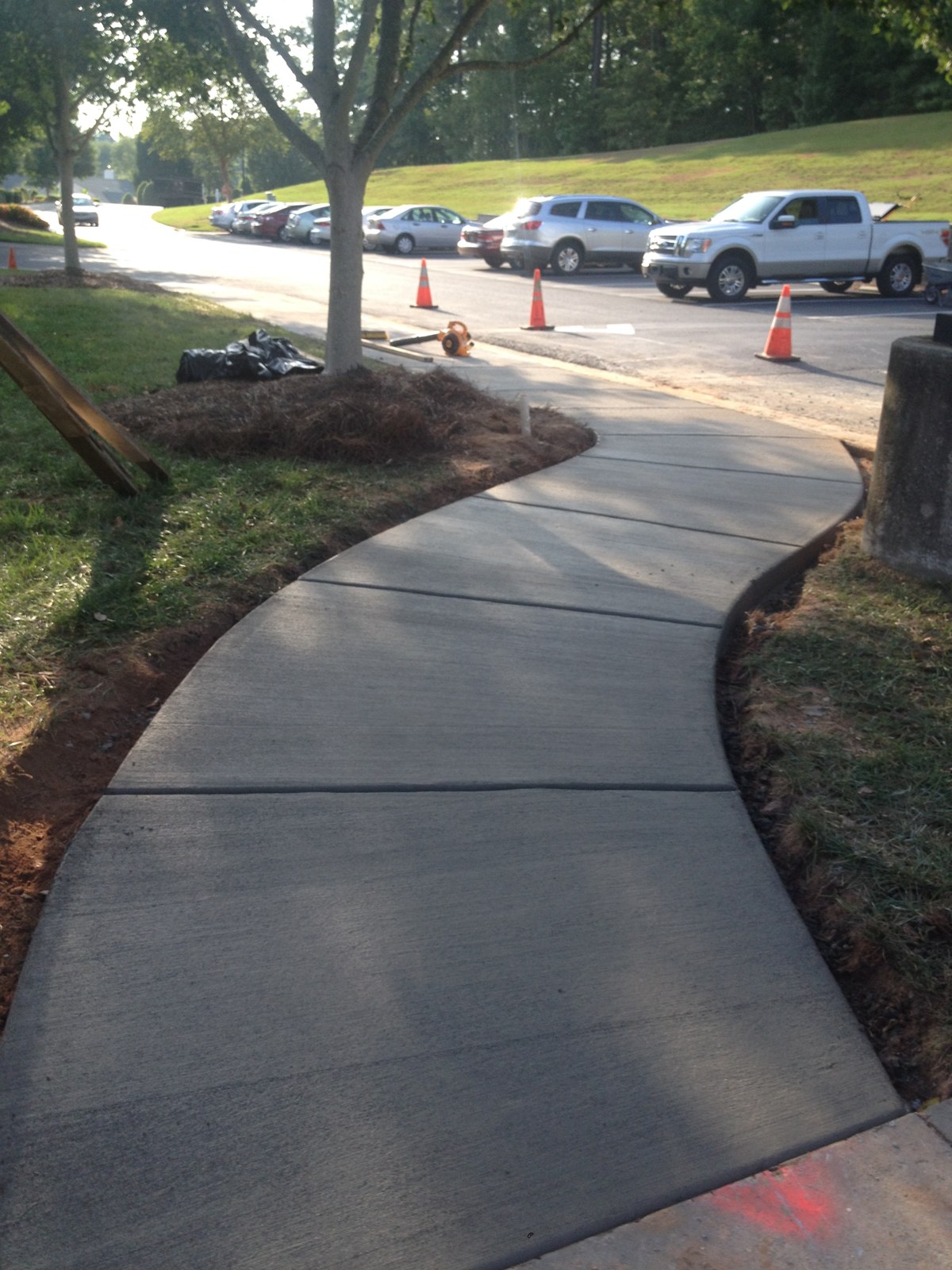 Finished curved concrete sidewalk with control joints