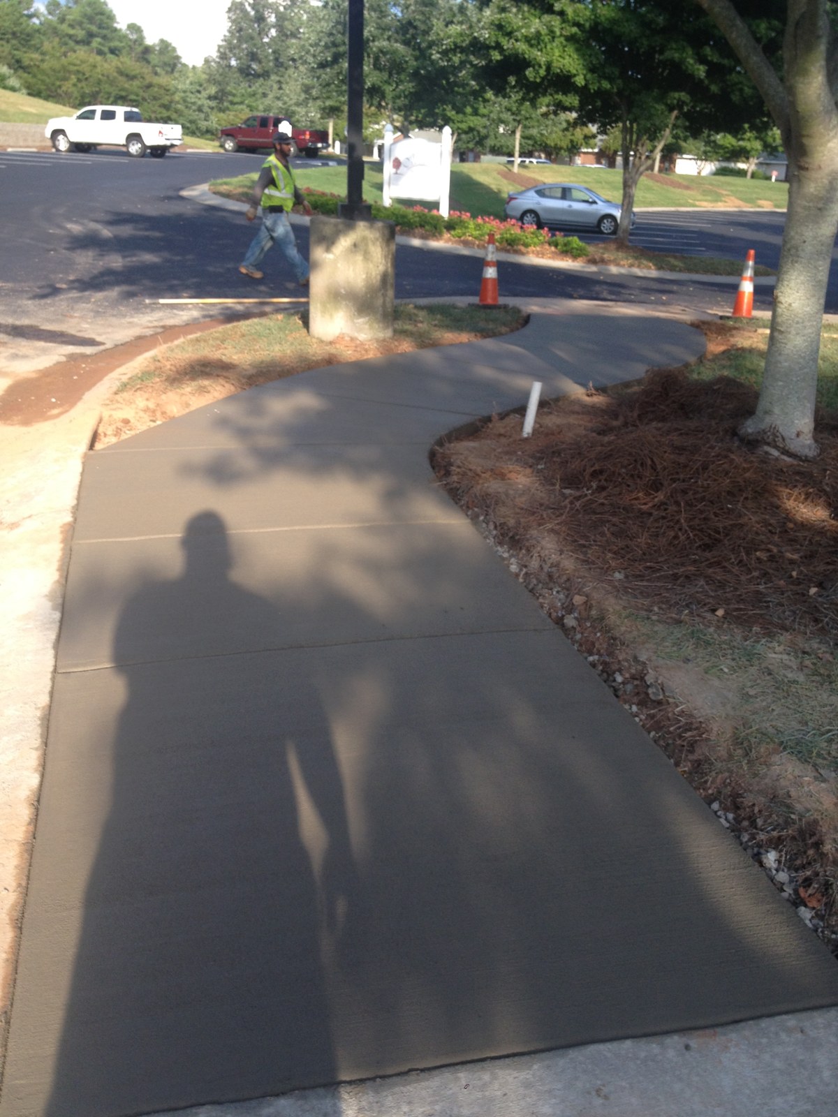 Finished curved concrete sidewalk with control joints