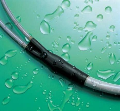 Thin-wall heat shrink tubing sealing a wire splice against moisture