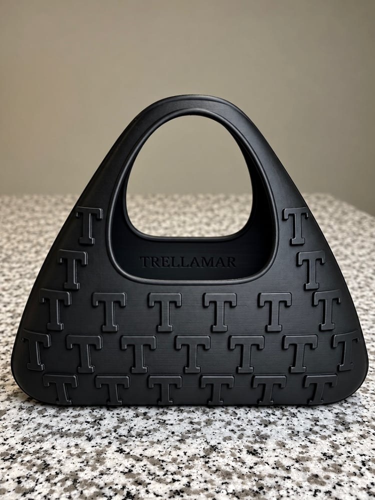 T-Monogram Bag (Noir), a black raised-monogram handbag
