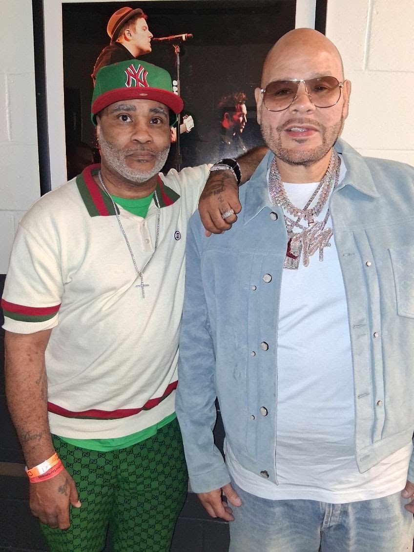 Lawrence McGriff and a companion posing together