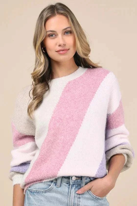 A soft ivory striped sweater from the Primrose Signature Boutique collection