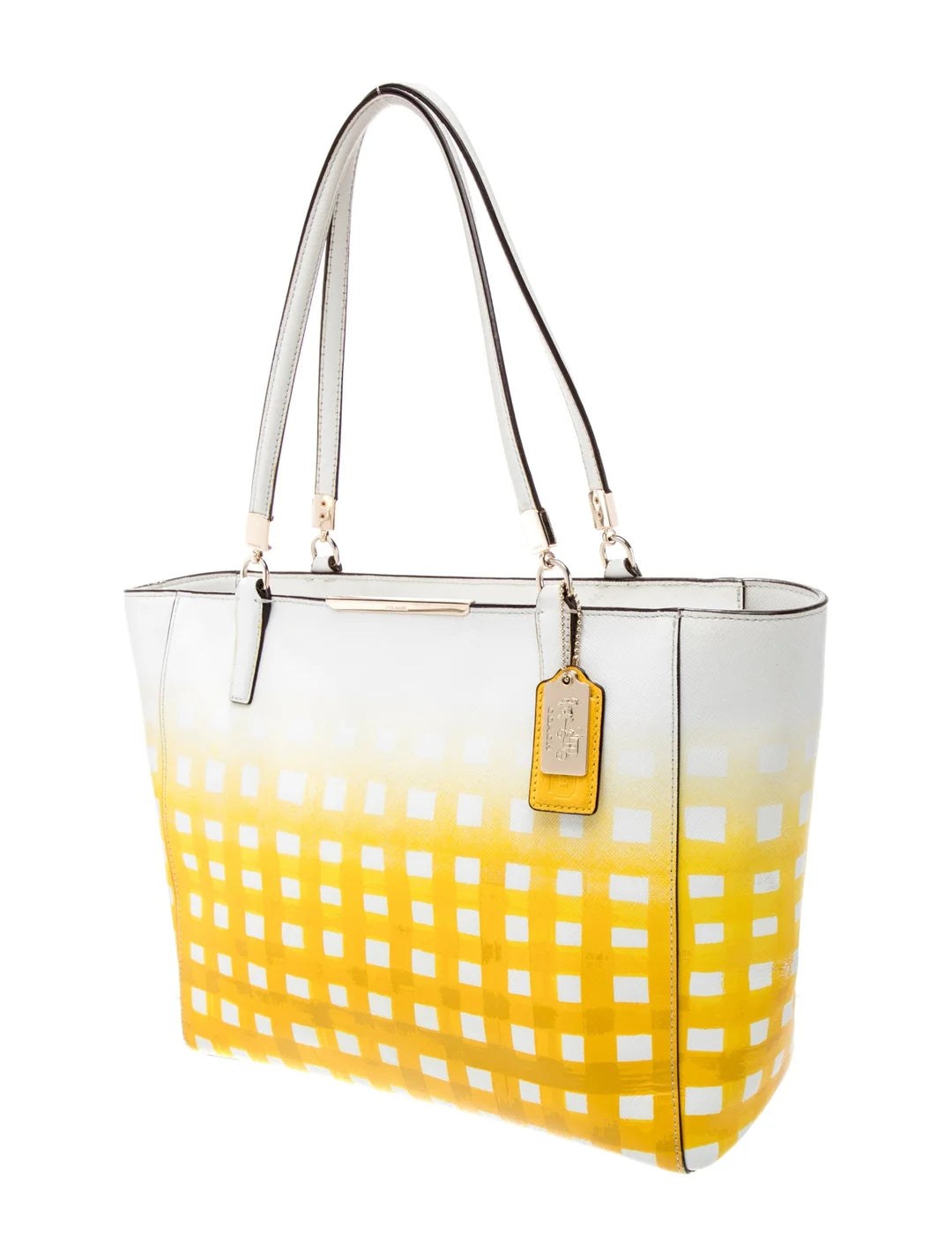 Yellow and white Coach tote bag from Primrose