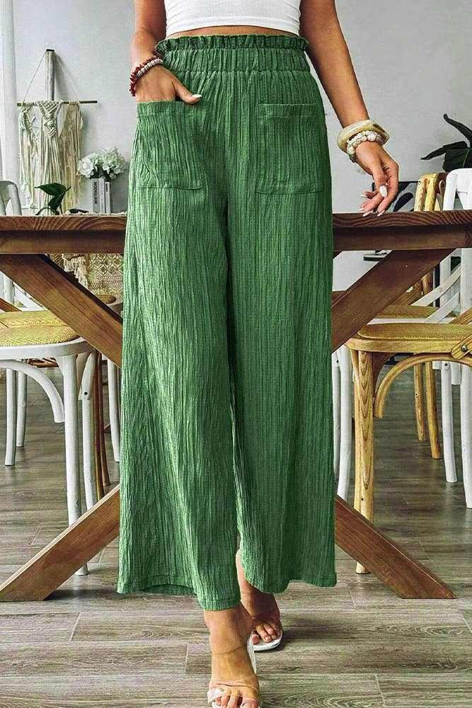 Green high-waist pants with pockets from the Primrose Signature Boutique collection