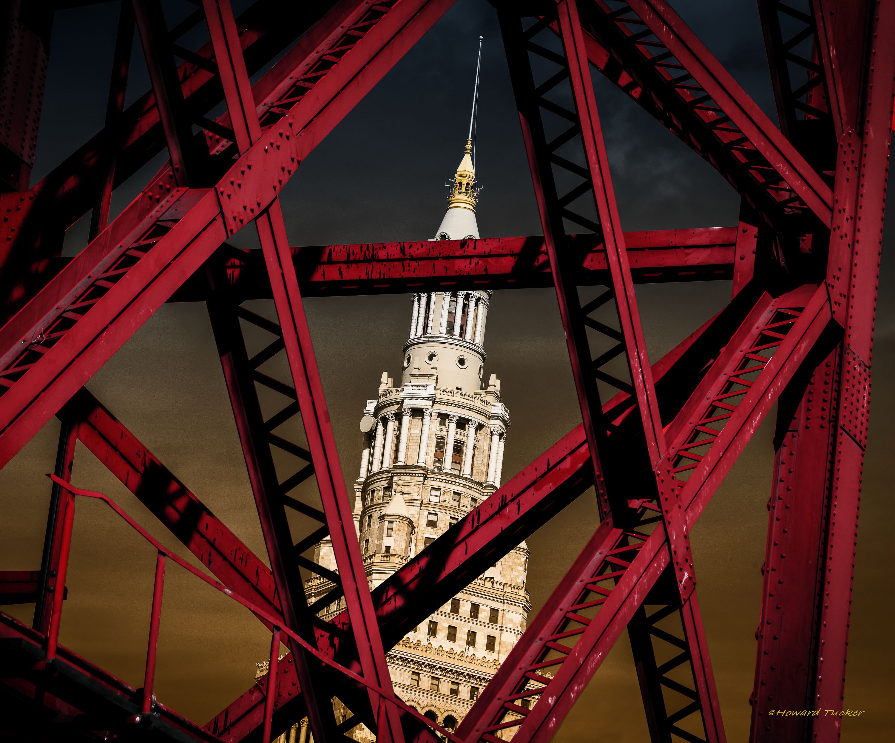 Terminal Tower framed by red steelwork in downtown Cleveland
