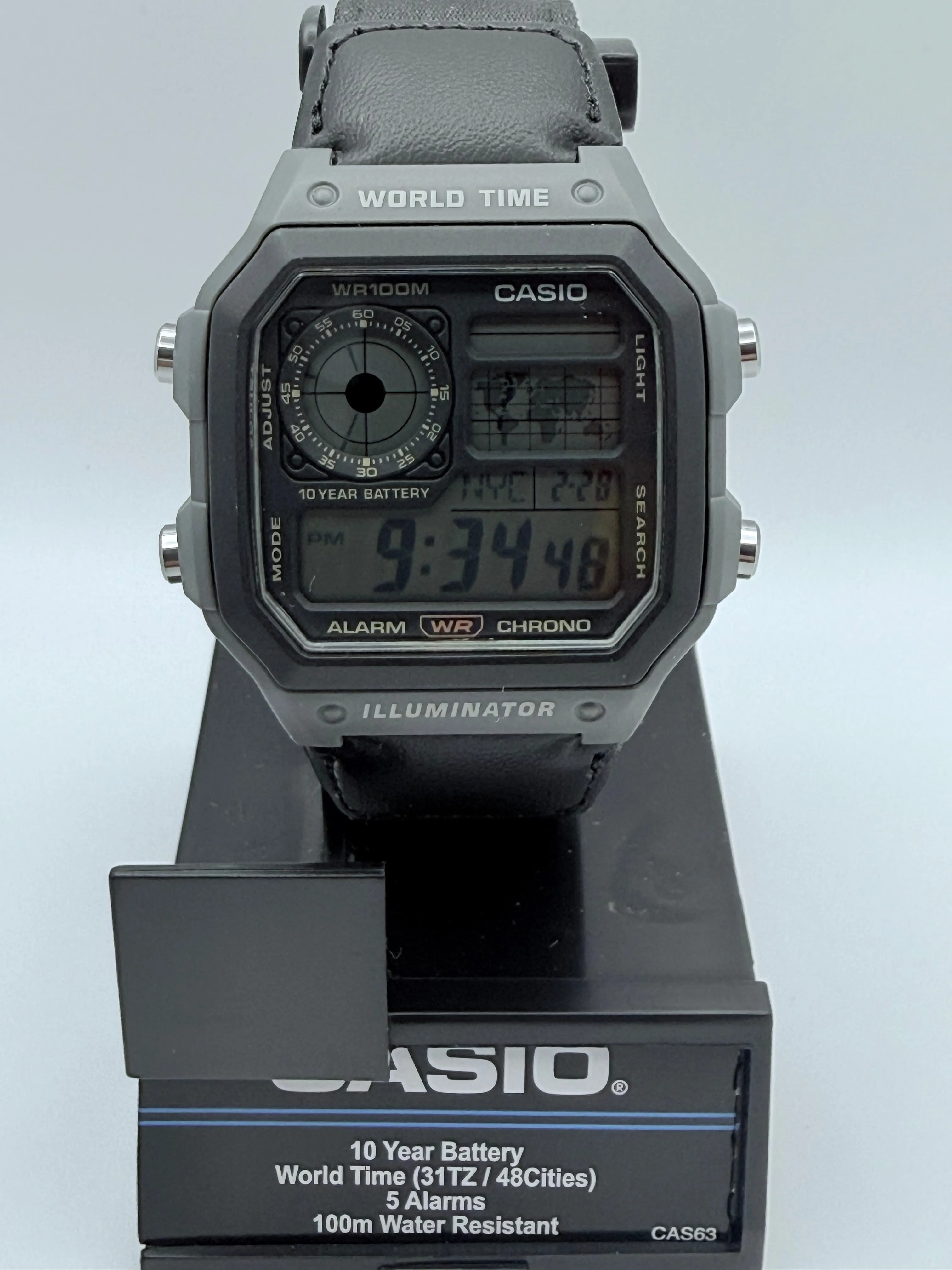 Casio AE1200 World Time watch on its presentation stand