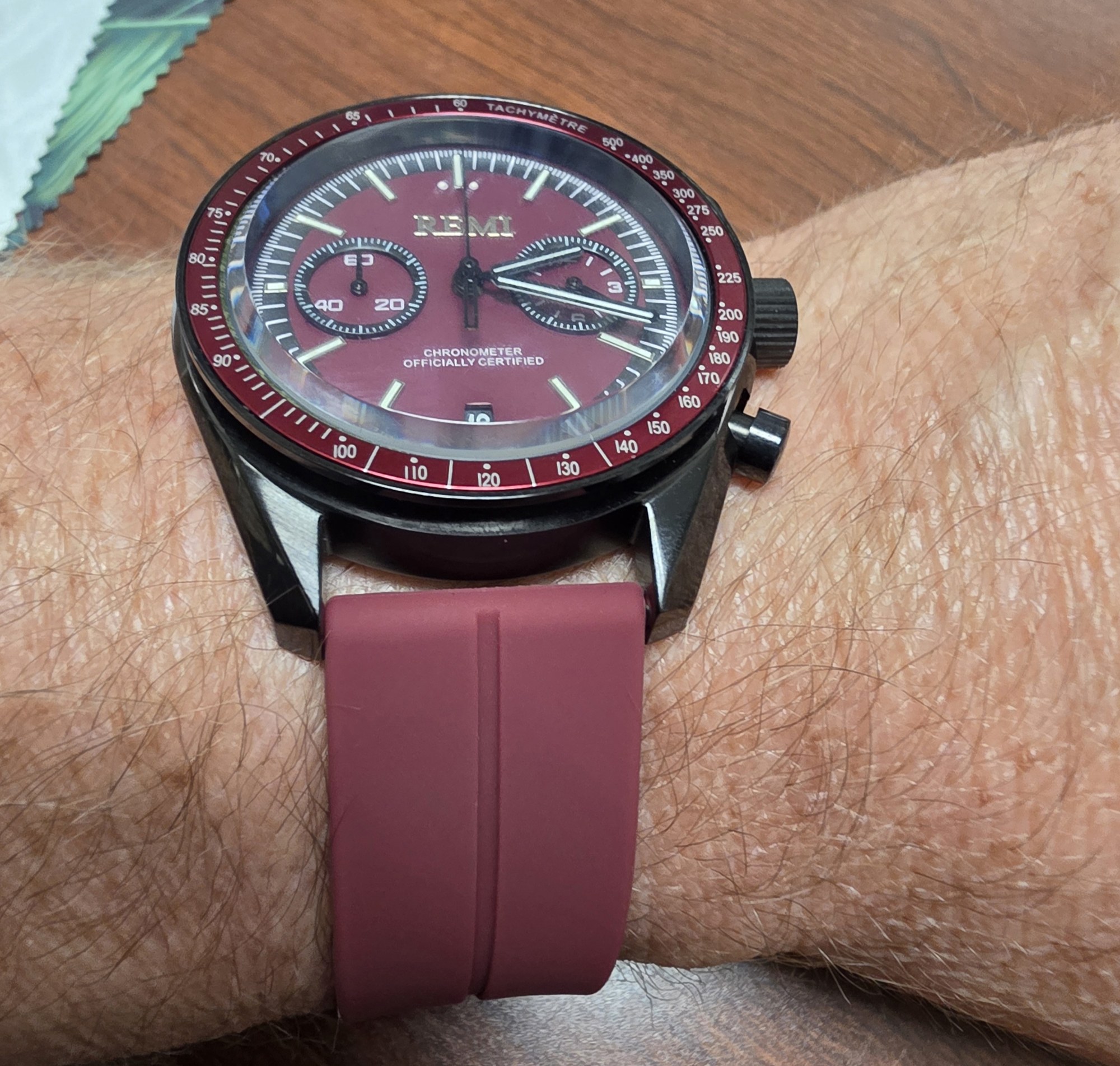 Close view of Jamey wearing the Deep Red chronograph