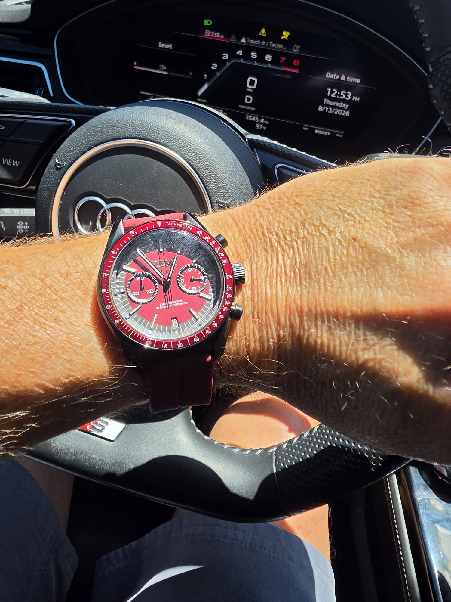 Jamey wearing his Deep Red chronograph inside a car