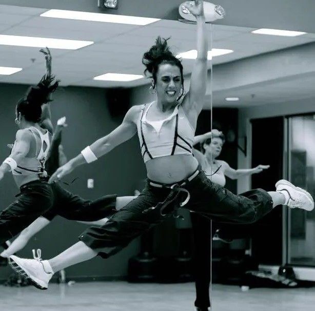Becky Forbes performing a jump split