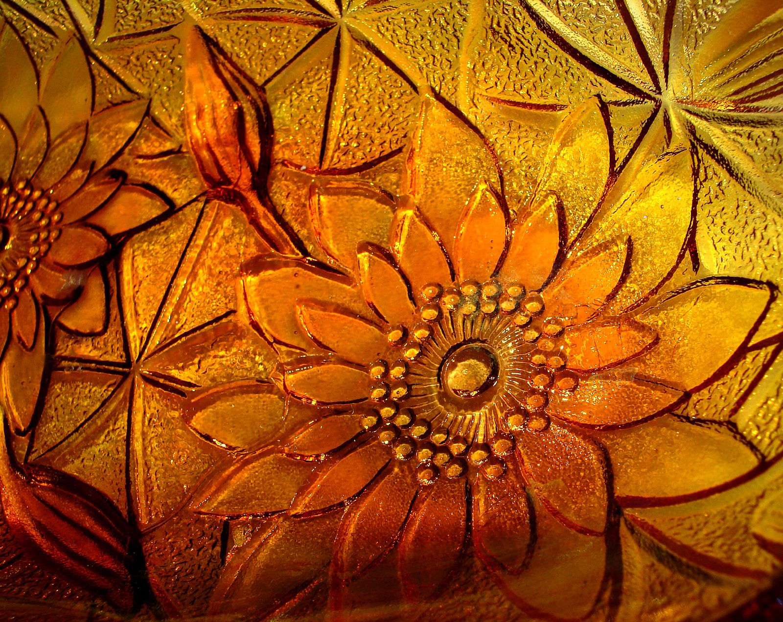 Close view of the raised molded pattern on carnival glass